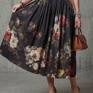 Greta | Abito midi plissettato floreale con collo alto e apertura a chiave